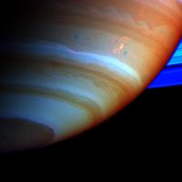 Saturn's atmosphere and its rings are shown here in a false color composite, featuring 'The Dragon Storm.'